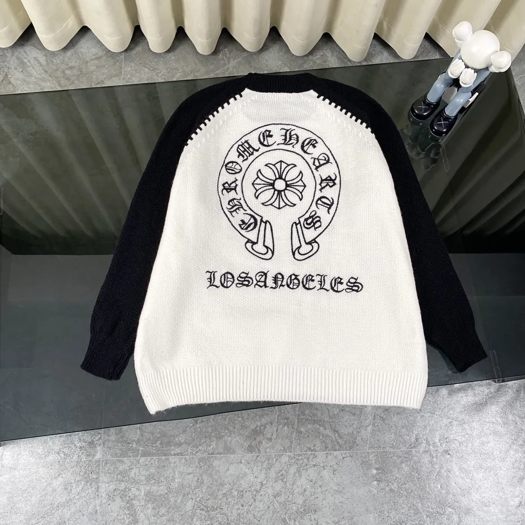 P260 ChromeHearts popular Chrome Hearts CH Sanskrit horseshoe cross embroidery pullover round neck raglan sleeve sweater. Contrast color splicing raglan round neck knitted sweater, unique knitting texture, soft and skin-friendly, classic pattern embroidery on the front and back. Retro chic. The contrasting color raglan sleeve design and the thick stitching craftsmanship at the joints make it look great when worn alone or layered! The fit is loose and slimming! Fashionable patchwork colored sweater, colorfully intertwined, with clear layers, warm and slimming. Whether worn alone or layered, you can easily control various styles and show your personal charm. The raglan sleeves are shoulder-width in contrasting colors and have ultra-detailed embroidery on the front and back, giving it a casual street feel. It looks great when worn alone! The sleeves are designed with contrasting colors and seams, and the round neck style reveals the neck and flatters the face shape! Wool blend knitted fabric, soft, comfortable and warm to the touch. Contrasting color design➕Loose fit, not flattering on your body shape and slimming, not to mention how easy it is to wear! Basic, versatile and fashionable classic! Black and white are versatile! Black and gray high-end! Couples get involved!  Color: black and white/black gray Size: S~M~L